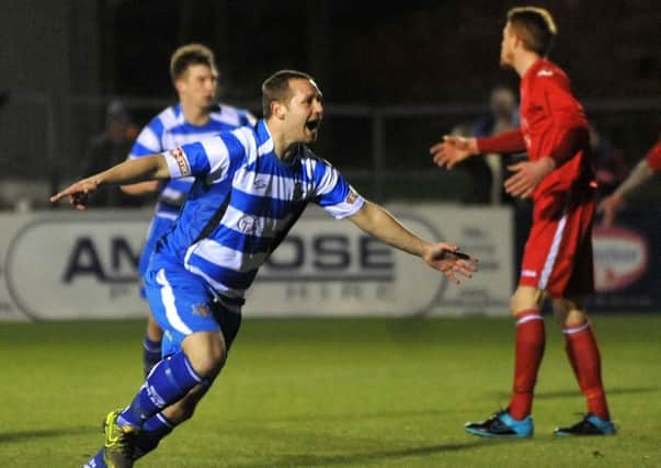 Zach Clark celebrates scoring for Lancaster City moments after coming off the bench. Picture: Rob Lock