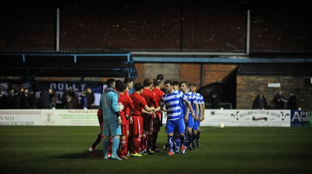 Lancaster City and Padiham shake hands before Tuesday night's semi-final. Picture: Rob Lock
