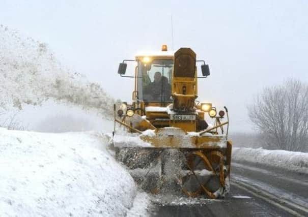 A gritter in action.