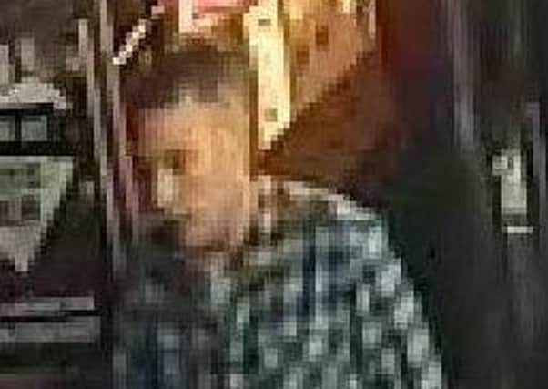 Police want to speak to this man in connection with an assault at the Kings Arms in Morecambe.