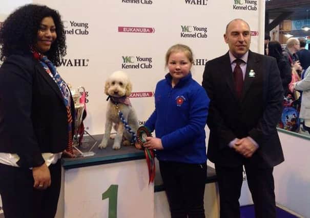 Hollie Walsh and her poodle Simba won at Crufts.
