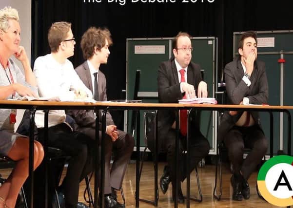 Councillors Margaret Pattison, Joshua Brandwood, Darren Clifford and Charlie Edwards taking part in Morecambe Community High School's Big Debate with host, sixth former Owen Lambert (centre). Still and video courtesy of Adamant.