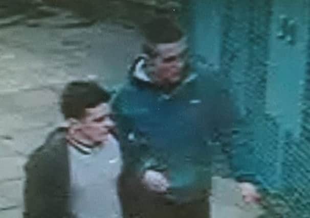 Police want to speak to these two young men after a bike was stolen from the RLI.