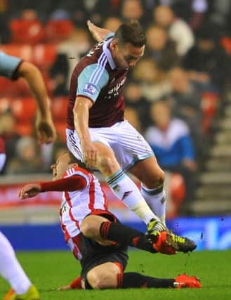 Kevin Nolan in action during his West Ham days.