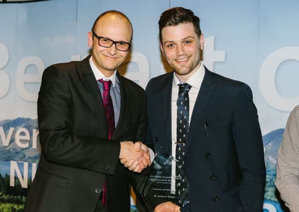Dr Andrew Walsh picked up the Learner of the Year award from UHMBTs Associate Director of Corporate Affairs, Phil Woodford. Picture by Steven Barber stevenbarber.co.uk.