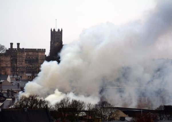 Smoke covers Lancaster city centre after a bad fire on Thursday morning. Photo by Darren Andrews.