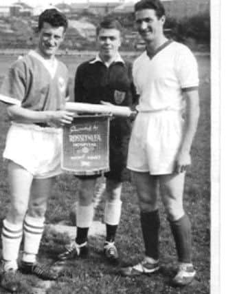 Bob Tyson at Barrows Lane with the team captains.

They may not always be loved by fans and players but the great game of football would not survive without the Man in Black. Here Terry Ainsworth (sponsored by Bay Camera & Communications) looks back on the career of Bob Tyson a referee of high standards who kept the peace for over 50 years in the amateur local game