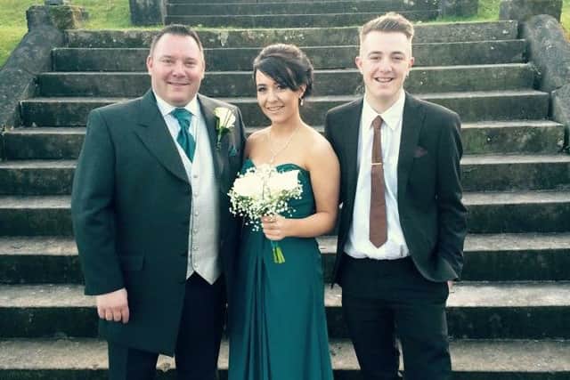 Ashley Cross with his daughter Amy and son Arron.