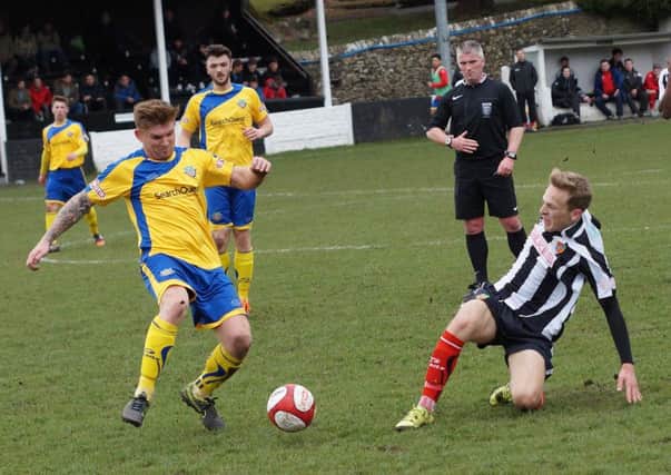 Tom Watson and Charlie Bailey battle for the ball at Parkside Road on Monday. Picture: Richard Edmondson