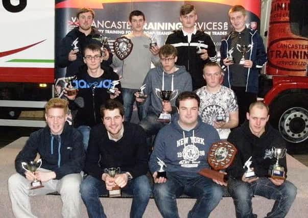 Some of the apprentices with their awards.