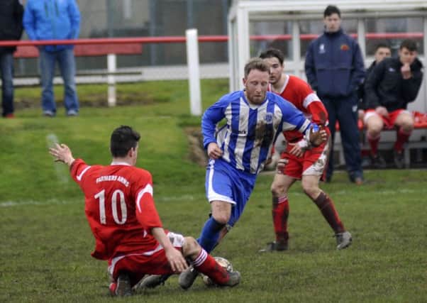 Tom Entwisle for Slyne with Hest in their game against Garstang FC.