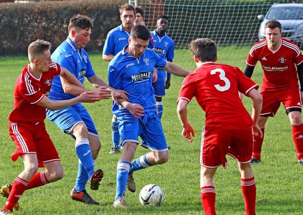 Caton United and Carnforth Rangers are fighting it out for the Premier League title.