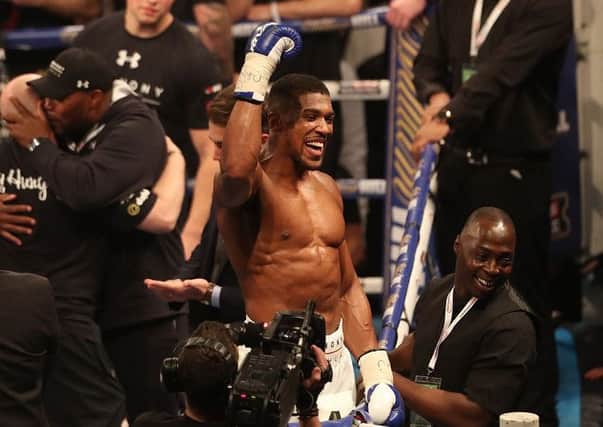 Anthony Joshua celebrates victory over Charles Martin. Picture: Lawrence Lustig/Matchroom Boxing