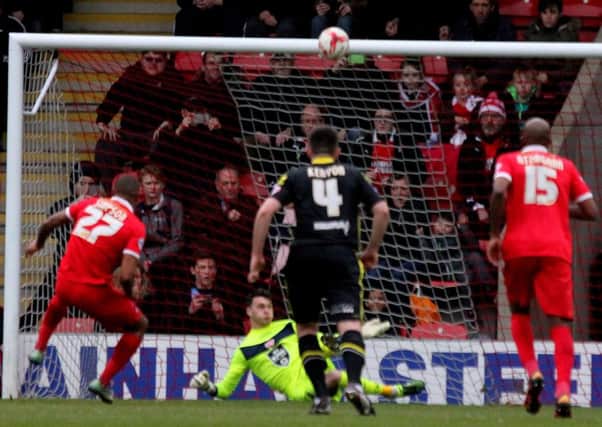 Kieran O'Hara saves Jay Simpson's penalty at Leyton Orient.