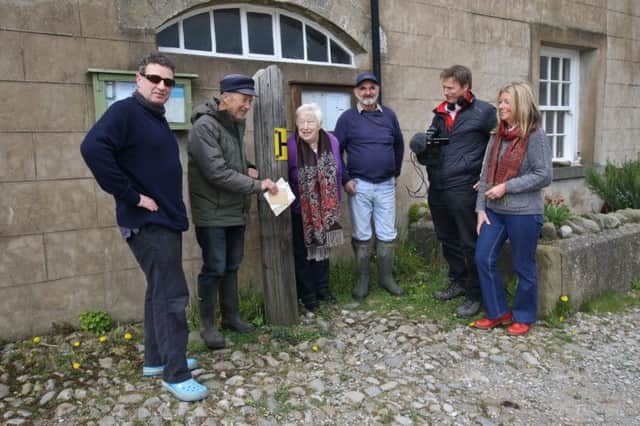 Sunderland Point residents with letters at the ready but no post box! Photo by Alan Smith.