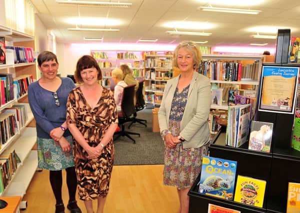 Photo: David Hurst Bolton Le Sands Library service Manager, Ros Sudworth, centre, with County Councillor Chris Henig, right, and Lancaster District Manager, Debbie Dawson, left, at the re-opening of the library after refurbishment