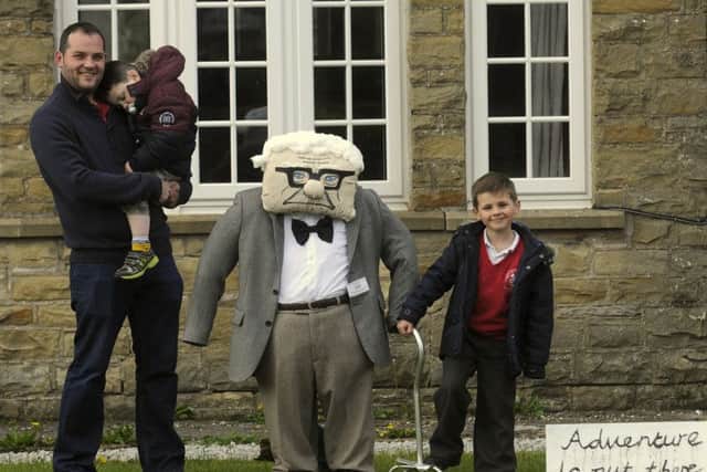 Wray Scarecrow Festival.  Andy Newport with sons Harry, 3 and Max, 5 with their scarecrow.