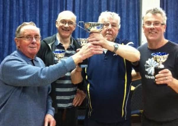 The winning St Lukes team with Lancaster and Morecambe Table Tennis League president David Hughes.