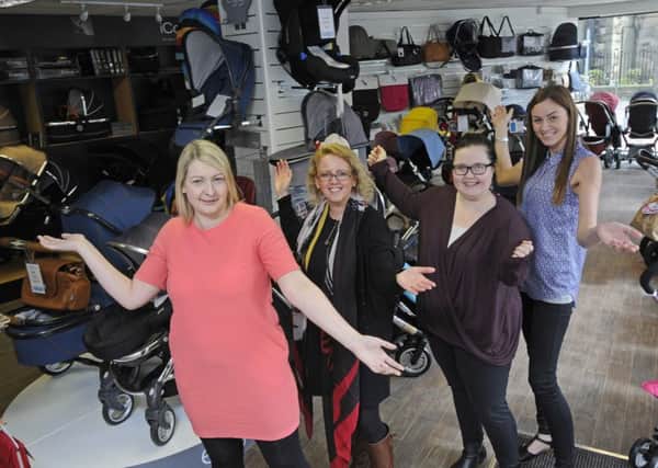 Simply Baby have reopened following damage from the floods. Pictured are some of the team from the shop L-R Leona Orange, Julie Shaw, Rebecca Hallett and Alicia Rose.