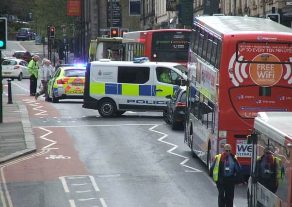 Police at the scene of the accident in Dalton Square just after lunch on Tuesday. Pic: Mark Braithwaite.