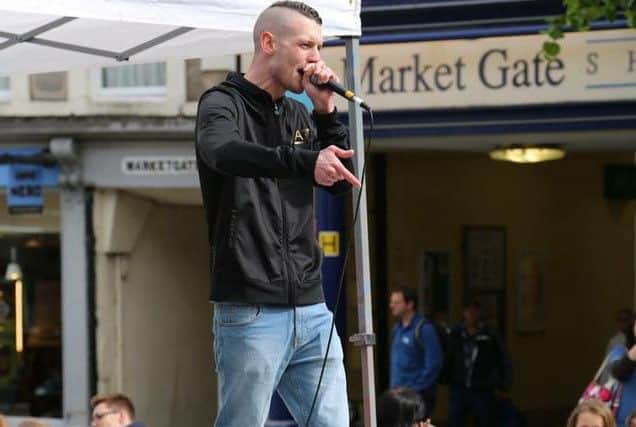 Dan Warrilow performing in Lancaster's Market Square