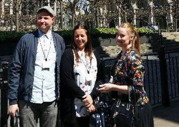 Parents John Donnelly, Kelly Price and Sarah Fogerty outside the Houses of Parliament.