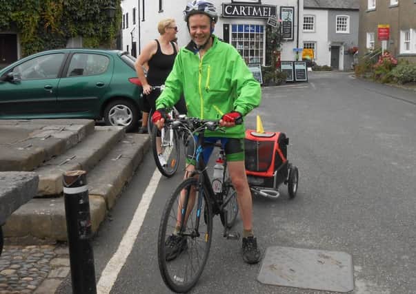 Former mayor of Lancaster Jon Barry on a charity cycle ride in Cartmel during his year in office.