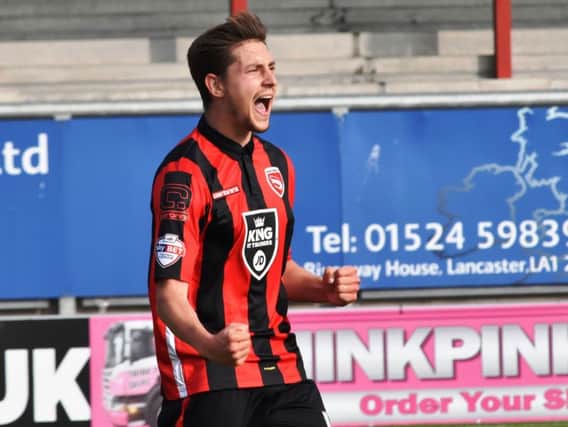 Shaun Miller celebrates his first Morecambe goal against Bristol Rovers.