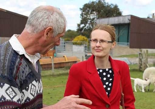 Cat Smith speaking to a local farmer.