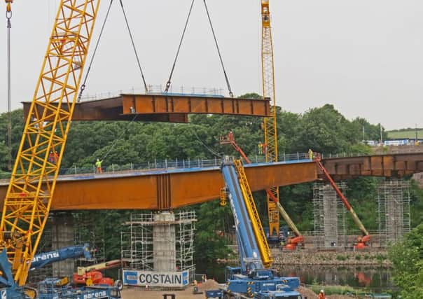 One of the last sections of the Lune West Bridge being put into place on the Heysham to M6 link road.