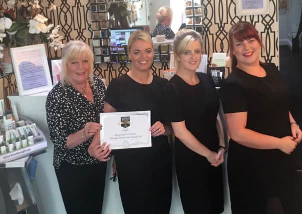 Kelly Murgatroyd (second left) and staff at Prestige Hair and Beauty in Morecambe.