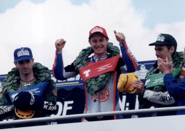 John McGuinness celebrates his first Isle of Man TT win back in 1999.
