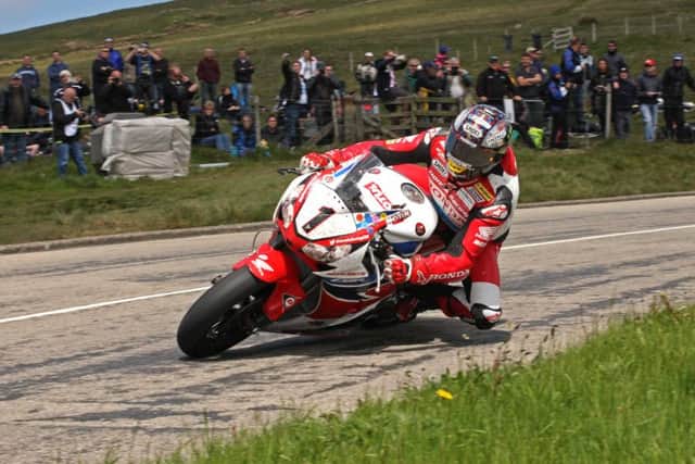 John McGuinness rounds the Bungalow section of the TT circuit back in 2014. Picture: Rod Neill