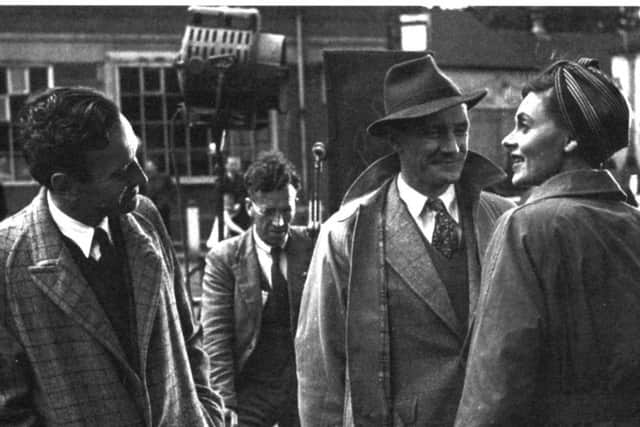 Director David Lean (left) gazes warmly at Celia Johnson as she rehearses a scene with Trevor Howard