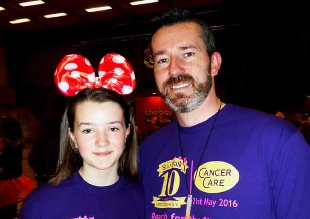 Amber Rutherford, 10, from Lancaster, with her dad Aaron Rutherford, who both took part in the Star Walk.