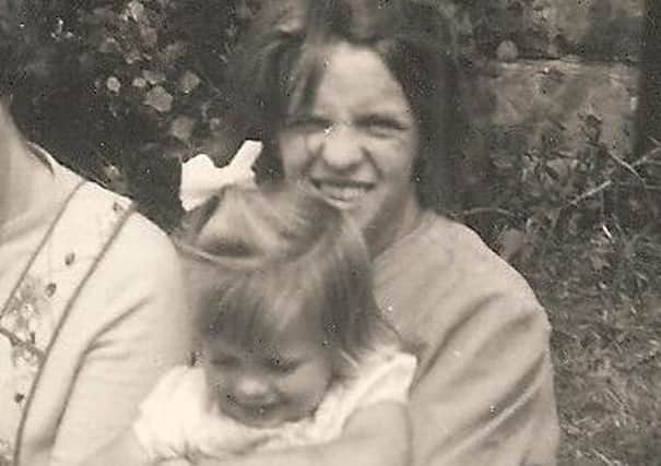 Anne Harris, pictured right with her birth mother Teresa shortly before she was adopted.
