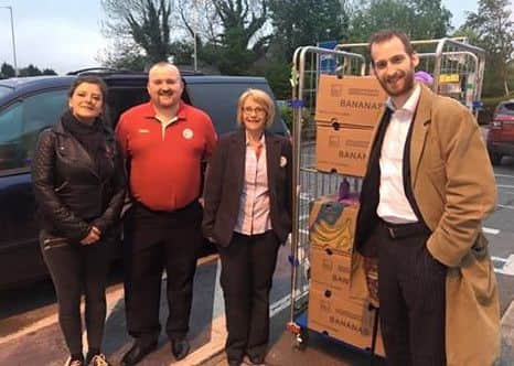 Mark Cutter with staff from Tesco in Carnforth and their recent delivery.