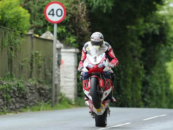 John McGuinness at Ballacrye during the RST Superbike TT race. DAVE KNEEN/PACEMAKER PRESS.