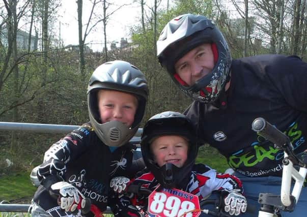 New children's author Graeme Dodds with his two sons Zack and Ollie and their BMX bikes.