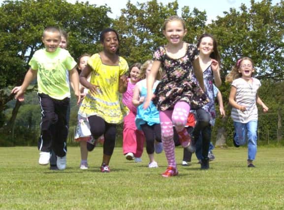 Children from Leeds enjoying the fresh air at the Silverdale holiday camp in 2011.