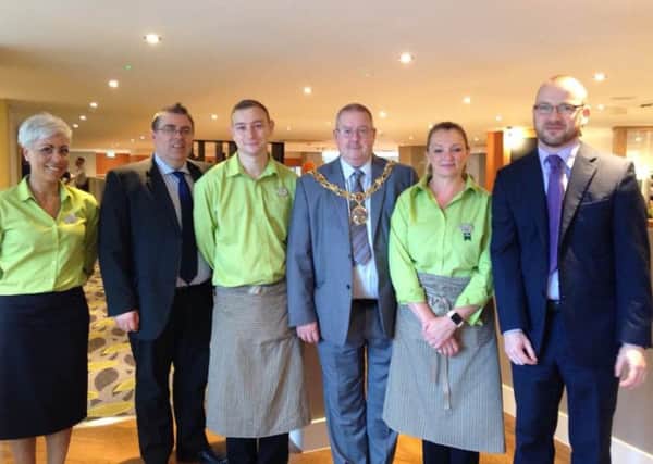 Holiday Inn staff Nina McWade, Francis Hindle, Dan Bateson, Julie Wood and David Steele with Lancaster Mayor Coun Robert Redfern (third from right).