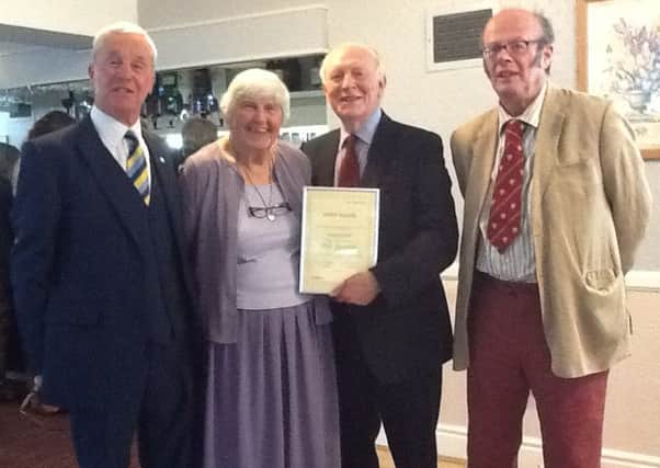 Lord Kinnock presents a merit award for long and distinguished service to the Labour Party to Dilys Greenhalgh, of Heysham at a social evening at the Headway Hotel, Morecambe with Coun David Smith (left) and former MP and ex-Lancaster City Council leader Stanley Henig (right).