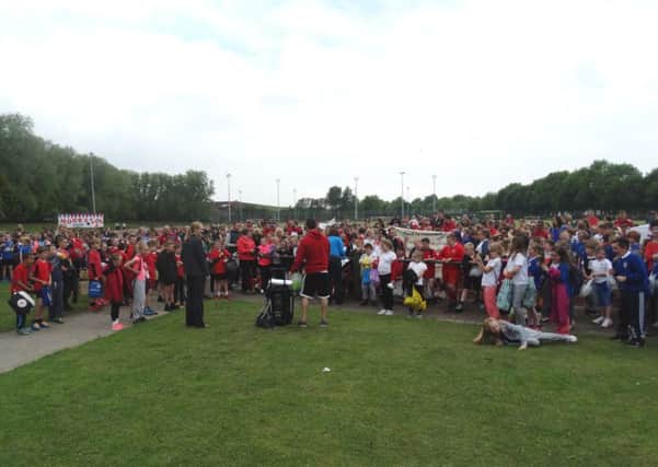 Pupils line up ahead of the festival at Salt Ayre Sports Centre.
