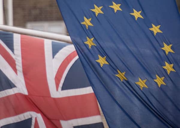 EU and UK flags. Photo: Stefan Rousseau/PA Wire