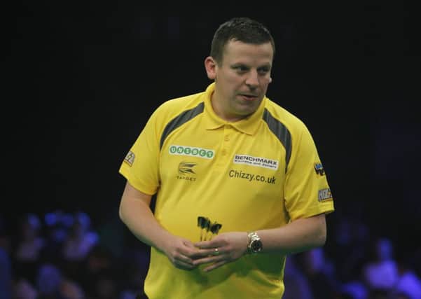 Dave Chisnall was beaten by Raymond van Barneveld. Picture: Lawrence Lustig.