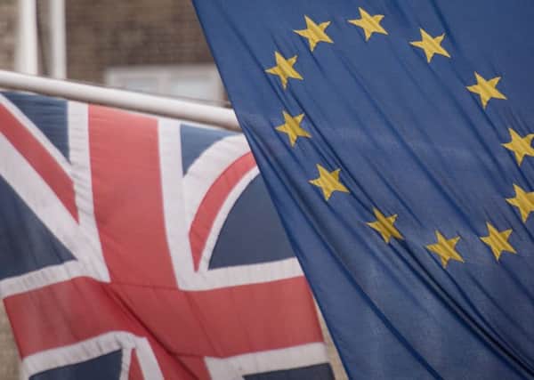 EU and UK flags . Photo: Stefan Rousseau/PA Wire