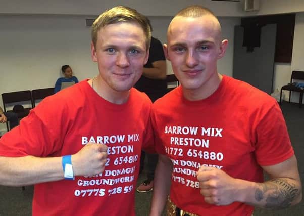 Reece MacMillan, right, with manager Kieran Farrell after victory in his second professional fight.