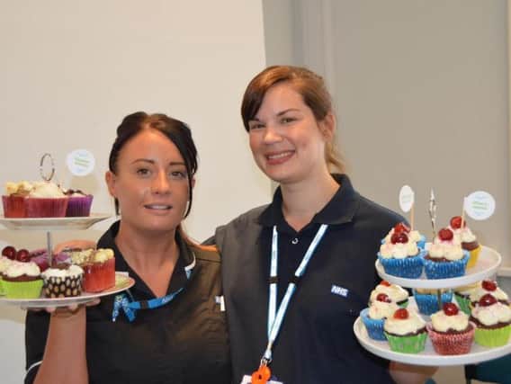Emily Wilson (left) and Tracy Blenkinship at the cake sale at Slyne Road in Lancaster.