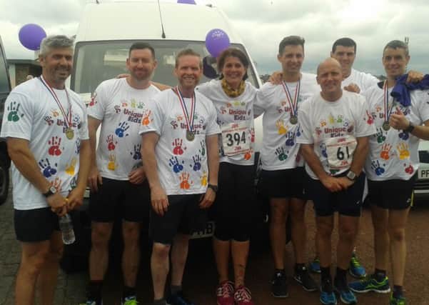 A team from Kirkham Open Prison joined in and raised more than Â£300 for Unique Kidz and Co.