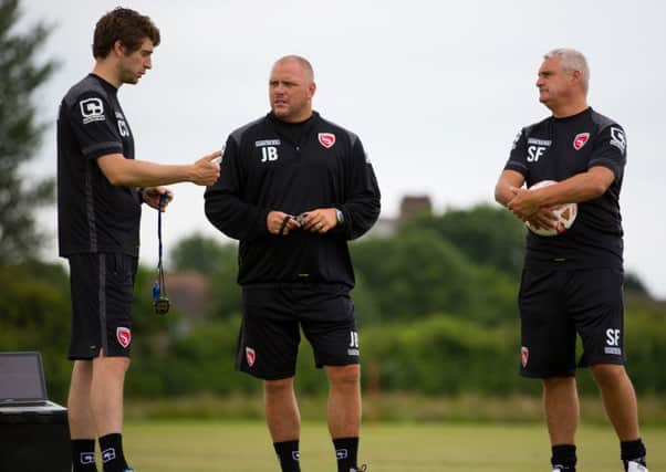 Jim Bentley with fitness coach Chris Squirrell, left, and physio Simon Farnworth, right.